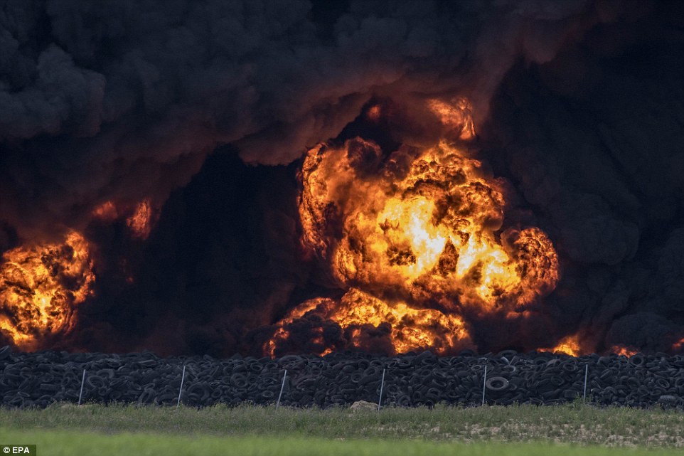 Thousands evacuated after massive fire at dump