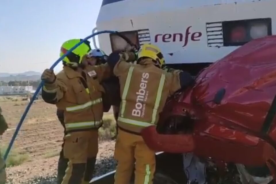 Four dead after train hits car on level crossing